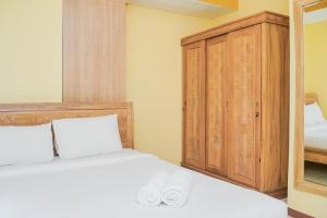 Tidy 2BR Apartment at Silkwood Residences near BINUS By Travelio