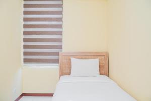 Tidy 2BR Apartment at Silkwood Residences near BINUS By Travelio