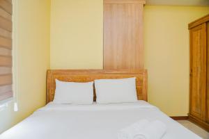 Tidy 2BR Apartment at Silkwood Residences near BINUS By Travelio