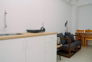 Cozy Living 2BR Apartment at Bassura City near Mall By Travelio