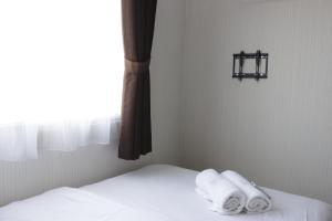 Homey 2BR Apartment at The Jarrdin Cihampelas By Travelio