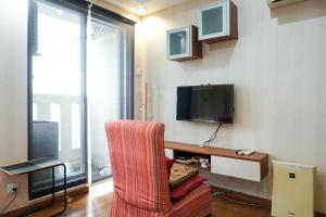 Cozy and Modern Studio Apartment at Belmont Residence Puri By Travelio