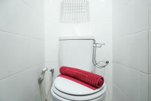 Cozy and Modern Studio Apartment at Belmont Residence Puri By Travelio