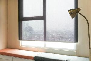 Cozy and Modern Studio Apartment at Belmont Residence Puri By Travelio