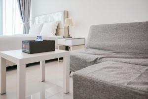 Cozy and Relax Studio Room at Tree Park City BSD Apartment By Travelio