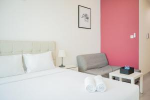 Cozy and Relax Studio Room at Tree Park City BSD Apartment By Travelio