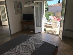 Sejours chez l'habitant CHAMBRE 1 Suite BEZIERS VILLENEUVE : photos des chambres