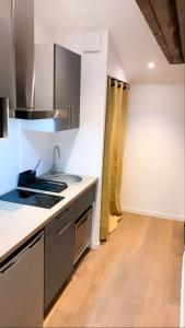 Appartements Les Logis de Candide : photos des chambres