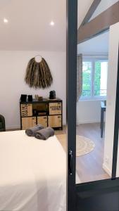 Appartements Les Logis de Candide : photos des chambres