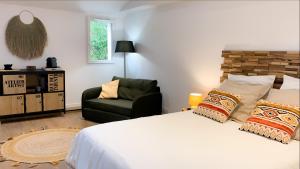 Appartements Les Logis de Candide : photos des chambres