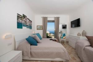 Chambre Double Deluxe avec Balcon - Vue sur Mer