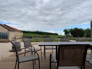 Maisons de vacances Aux Cortons - Maison avec vue sur le vignoble : photos des chambres