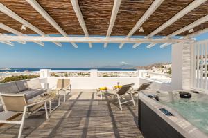 Grand Terrace Suite with Panoramic Sea View and Outdoor Hot tub  room in Rochari Hotel