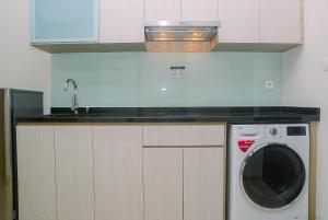 Elegant and Stylish Studio Menteng Park Apartment By Travelio