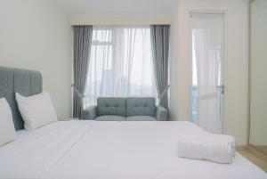 Elegant and Stylish Studio Menteng Park Apartment By Travelio