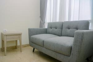 Elegant and Stylish Studio Menteng Park Apartment By Travelio