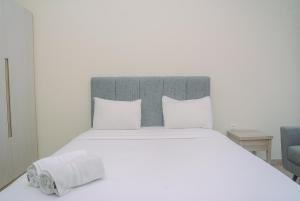 Elegant and Stylish Studio Menteng Park Apartment By Travelio