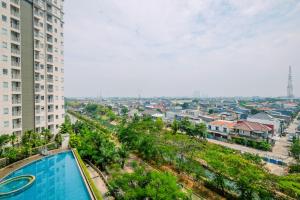 Wonderful 1BR Apartment at Mustika Golf Residence with Golf View By Travelio
