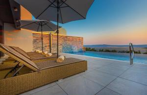 Luxury Villa Lorena with heated pool, jacuzzi,sauna and seaview