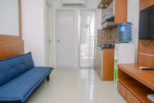 Comfortable and Fully Furnished 2BR Bassura City Apartment By Travelio