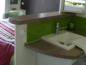 Maisons de vacances Camping Au Clos de Beaulieu : photos des chambres