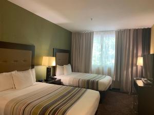 Studio Suite 2 Queen beds room in Country Inn & Suites by Radisson San Jose International Airport CA