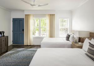 Queen Room with Two Queen Beds and Garden View room in Parrot Key Hotel & Villas