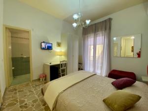 Classic Quadruple Room room in Night & Day