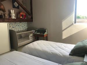 Maisons de vacances Maison Loiseau - Maison Calme au Centre de Beaune : photos des chambres