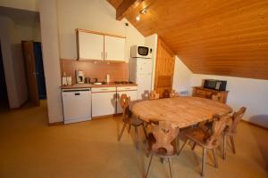 Chalets VAUJANYLOCATIONS - Les Balcons de Vaujany : photos des chambres