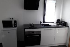 Appartements Logement neuf de 40 m², equipe et confortable : photos des chambres