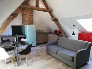 Appartements Au cochon qui rit : photos des chambres