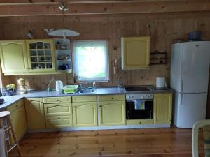 Drewniany domek w Otominie