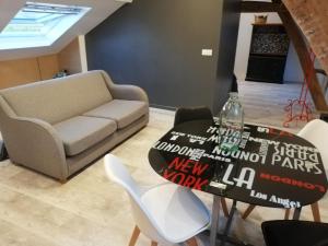 Appartements Au cochon qui rit : photos des chambres