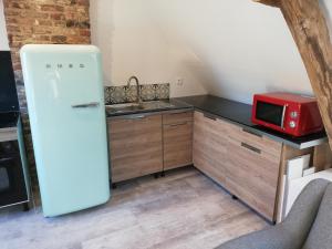 Appartements Au cochon qui rit : photos des chambres