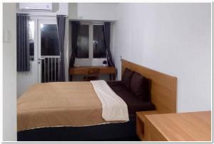 RedDoorz Apartment at Grand Sentraland Karawang