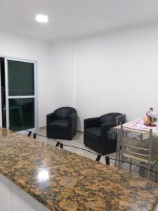Apartamento Temporada pé na areia