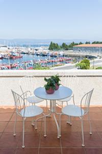 Apartamento boutique con terraza y vistas al mar. Porto Vilanova