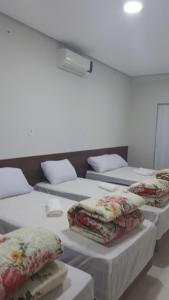 Flat familiar com ar,wi fi,cozinha e garagem