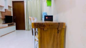 Pool View 2BR Apartment at Capitol Park Residence By Travelio