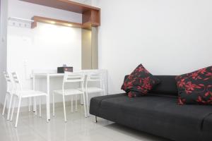 Pleasant 1BR Apartment with Sofa Bed at Dago Suites By Travelio