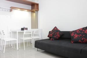 Pleasant 1BR Apartment with Sofa Bed at Dago Suites By Travelio