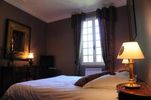 Hotels Hostellerie Restaurant Les Gorges de l'Aveyron : photos des chambres