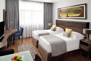 Superior Twin Room room in Mövenpick Hotel Apartments Al Mamzar Dubai