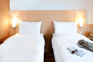 Hotels ibis Lyon Est Chaponnay : photos des chambres