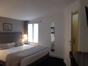 Hotels Aerotel Versailles Saint Cyr - L'etape du Silence : photos des chambres