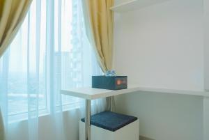 New Furnished Studio Grand Kamala Lagoon Apartment By Travelio