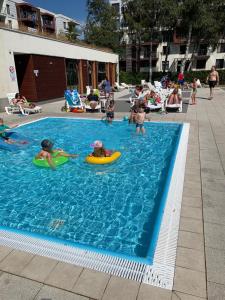 Seaside Polanki Apartments - summer outdoor swimming pool, saunas, two playgrounds for children, gym, individual garage included in the price Klonowa 17E
