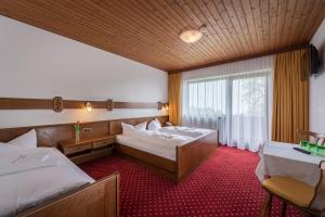 Double Room with Balcony (2 Adults + 1 Child) room in Schwannerwirt