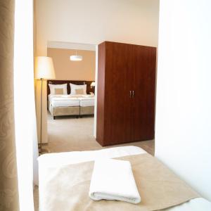 Economy Triple Room room in Hotel KOZÁK